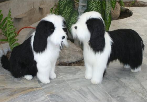 Мягкая игрушка собака Hansa Овчарка сидящая 75 см белый черный искусственный мех