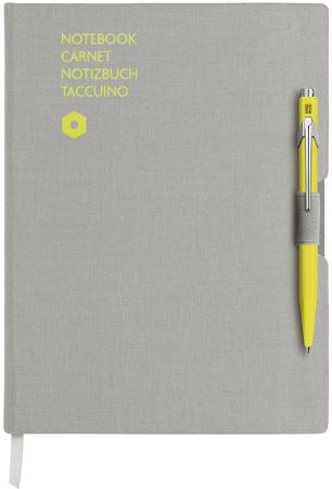 Записная книжка Carandache Office (8491.401) серый A5 192стр. в линейку в компл.:ручка шариковая 849 желтый